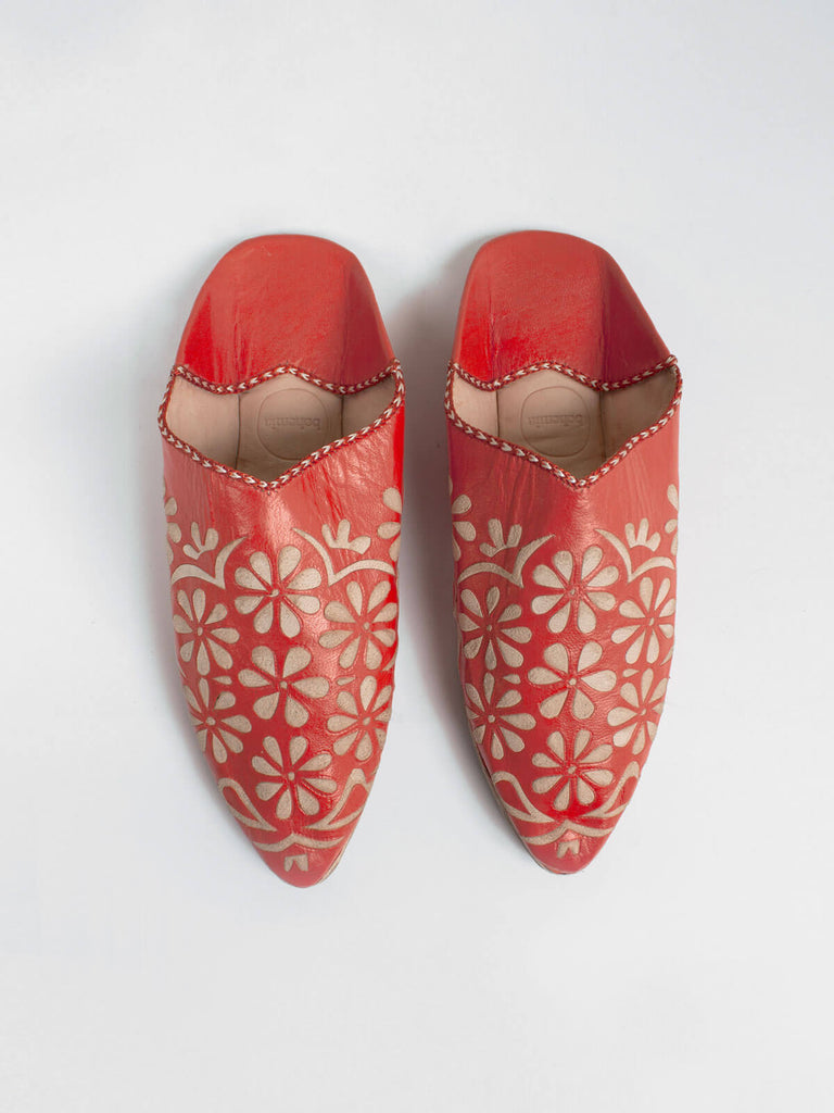 Moroccan decorative babouche slippers in orange leather with daisy pattern