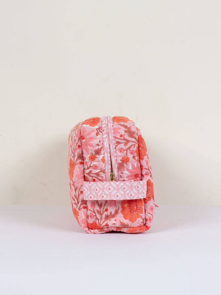 Vintage pink quilted Floribunda washbag with practical carry handle.
