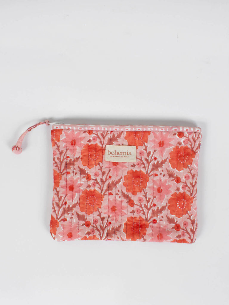 Quilted cotton zip pouch with a block printed vintage pink floral design