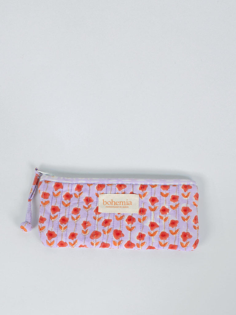 Long quilted zip pouch with lilac and orange block printed pattern
