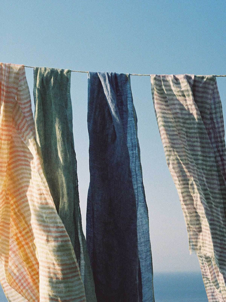 Summer Linen scarves hanging on a washing line