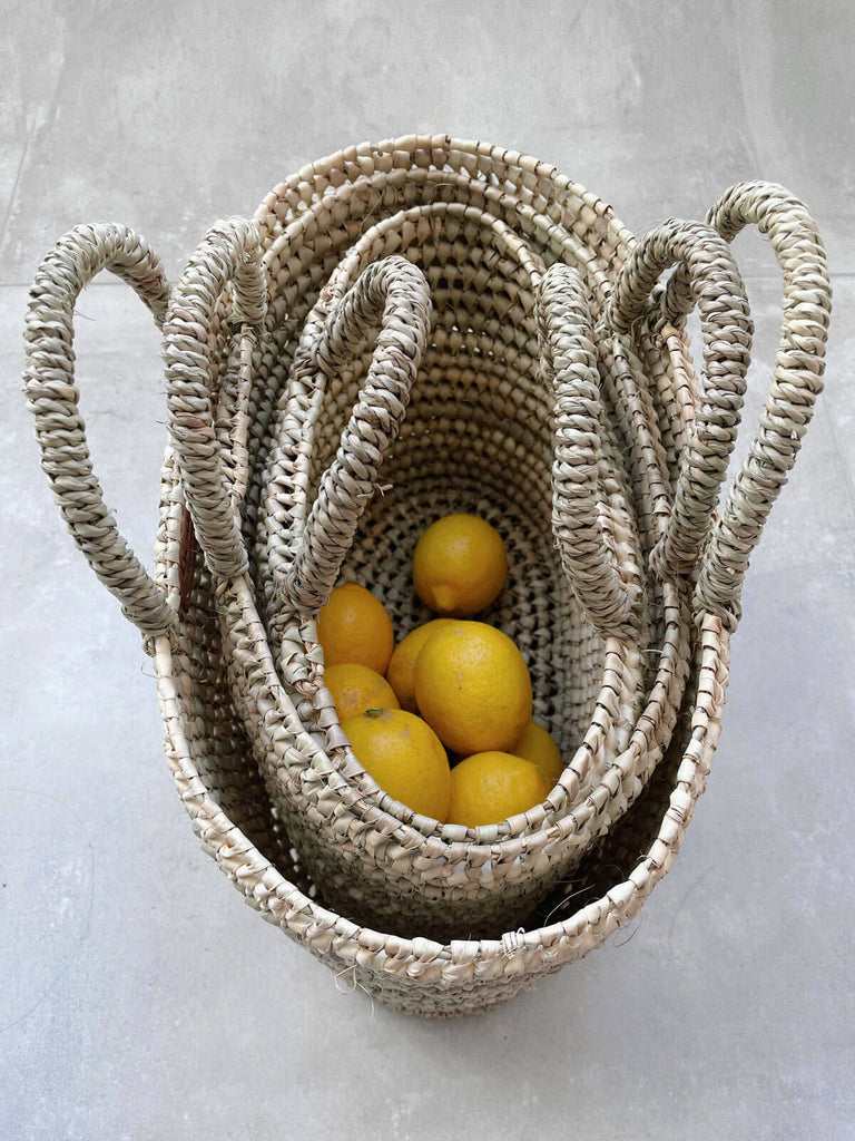 Set of three wholesale woven nesting basket bags by Bohemia