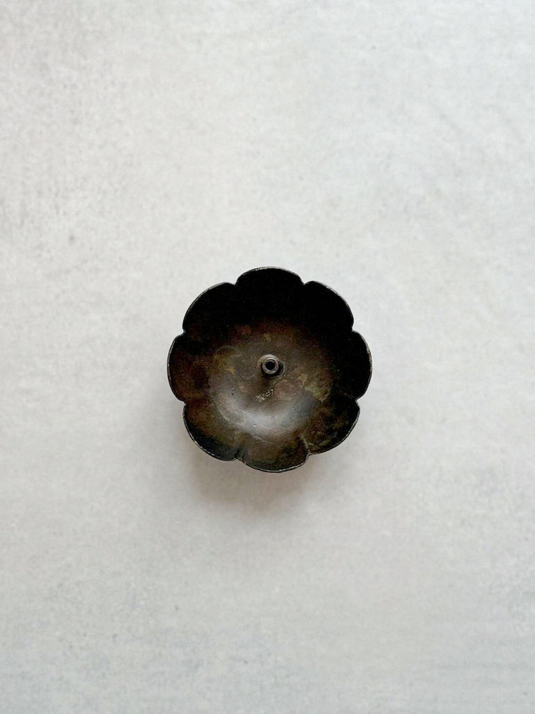 Poppy shaped incense holder in antiqued metal