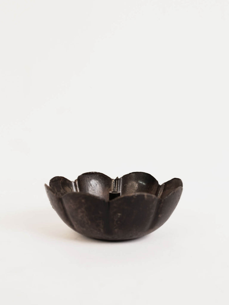 Poppy shaped incense holder handcrafted from sheet iron.