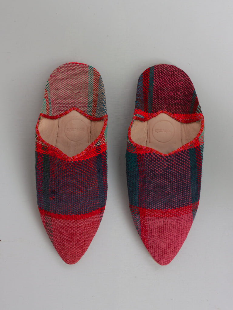 Limited edition Moroccan boujad pointed leather and textile babouche slippers with a red and pink check pattern.