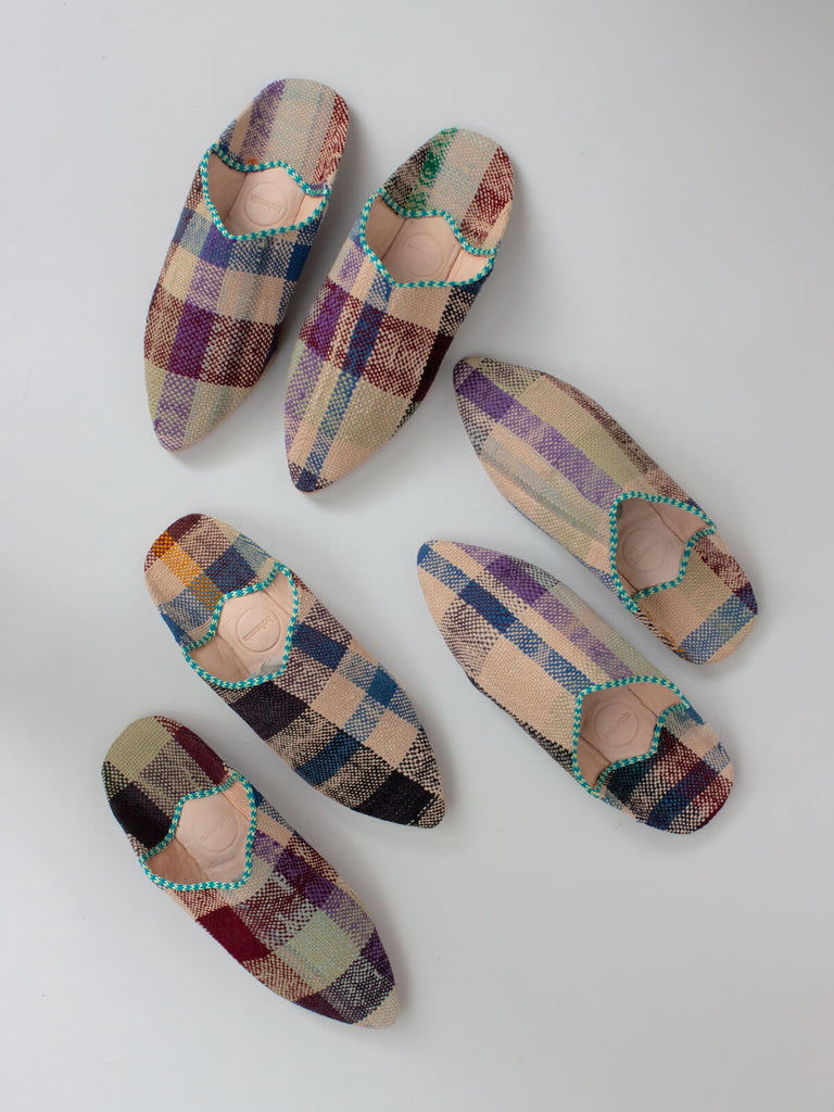 Three pairs of limited edition textile and leather Moroccan boujad pointed babouche slippers with unique natural check patterns.