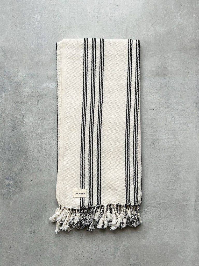 Soft and tactile cotton hammam towel with a simple charcoal black stripe by Bohemia Design