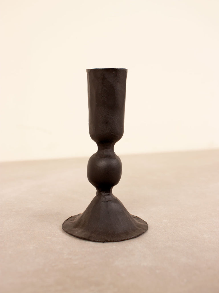 Small black iron Austen candle holder with textured surface 