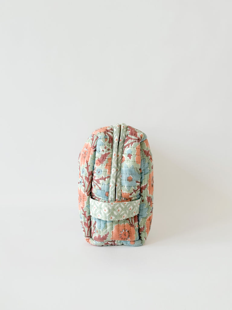 Handy carry handle on the side of the Floribunda quilted washbag in duck egg by Bohemia Design