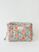 Large Floribunda cotton quilted wash bag with hand block printed floral design in soft duck egg by Bohemia Design