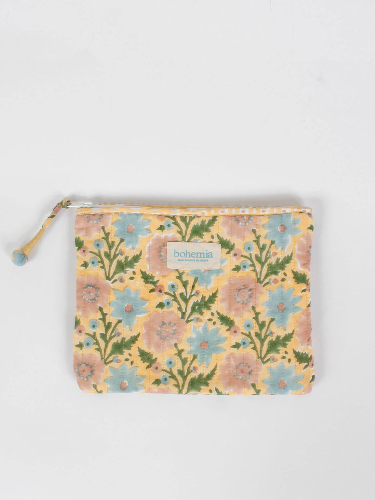 Large quilted cotton zip pouch with a block printed buttermilk yellow and blue floral design