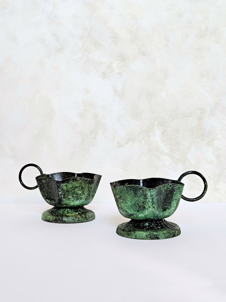 A couple of Frill candle holders with distinct rustic green moss textures, showcasing their unique differences | Bohemia