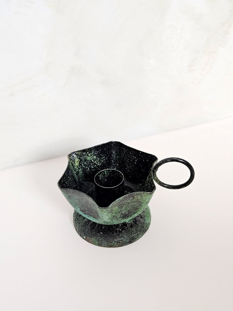 Top view of Frill candle holder with a vintage finger hold in a rustic green-moss finish | Bohemia