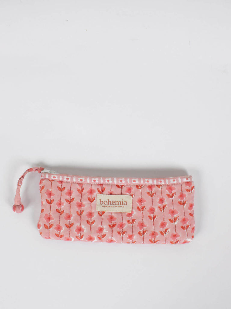 Long quilted zip pouch with vintage pink block printed pattern