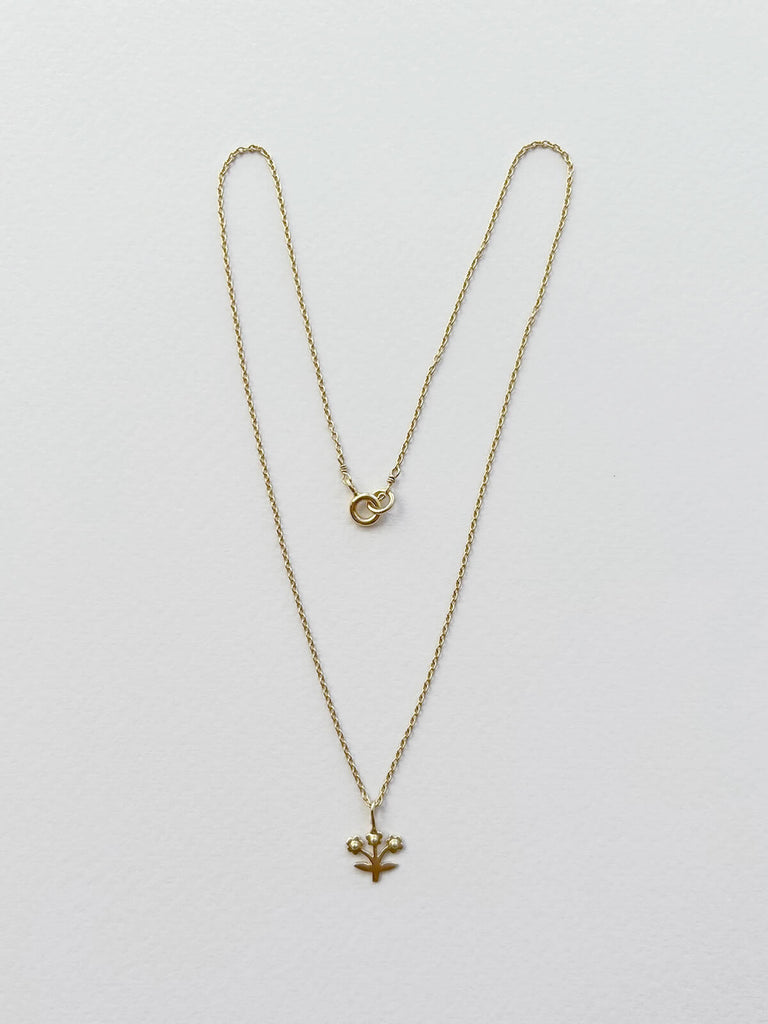 Wholesale gold posie necklace on a fine gold chain by Bohemia