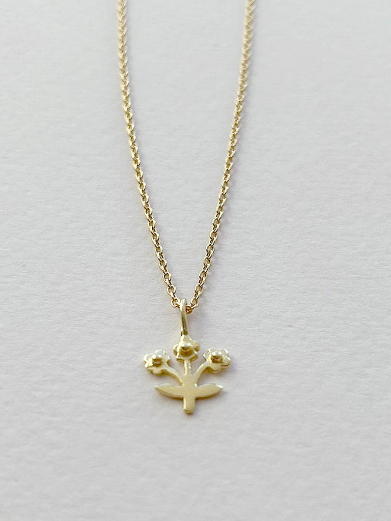 Small gold posie necklace on a fine gold chain for wholesale