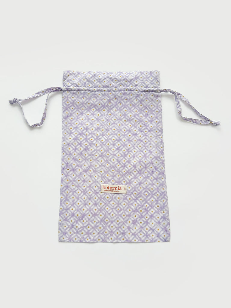 Cotton voile drawstring bag in light Lilac hue with Bohemia small label on the front.