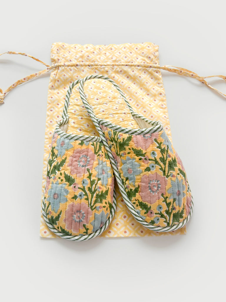 Buttermilk yellow house slippers with a lining in a contrasting Ditsy print and a matching cotton voile drawstring bag - ideal for travel | Bohemia Design