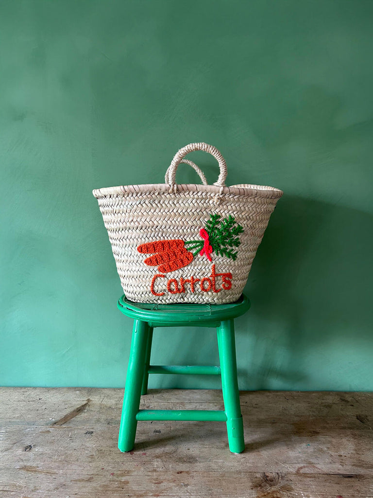 Small woven market basket bag with handles, adorned with charming carrot illustrations and text embroidery | Bohemia Design