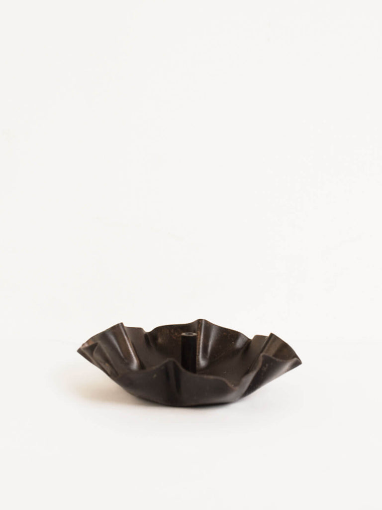 Handcrafted metal incense holder in delicate lotus flower inspired shape