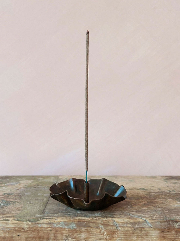 Lotus flower shaped incense holder handcrafted from antiqued iron sheet.