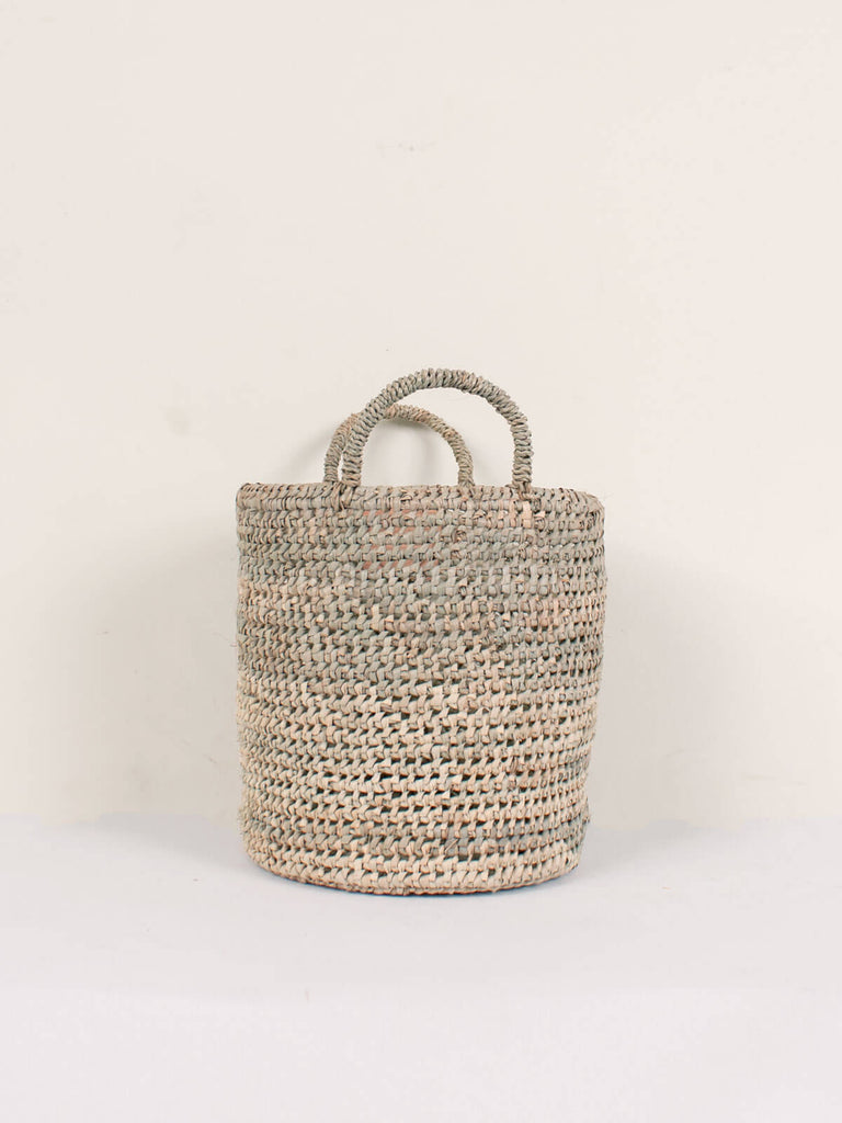 Large round open weave nesting basket with two short handles