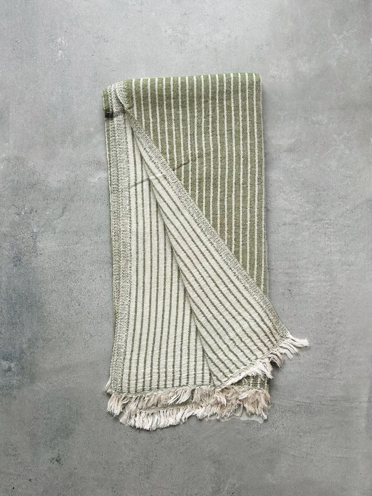 Turkish cotton hammam towel in olive green, featuring a soft textured striped pattern on both sides | Bohemia Design