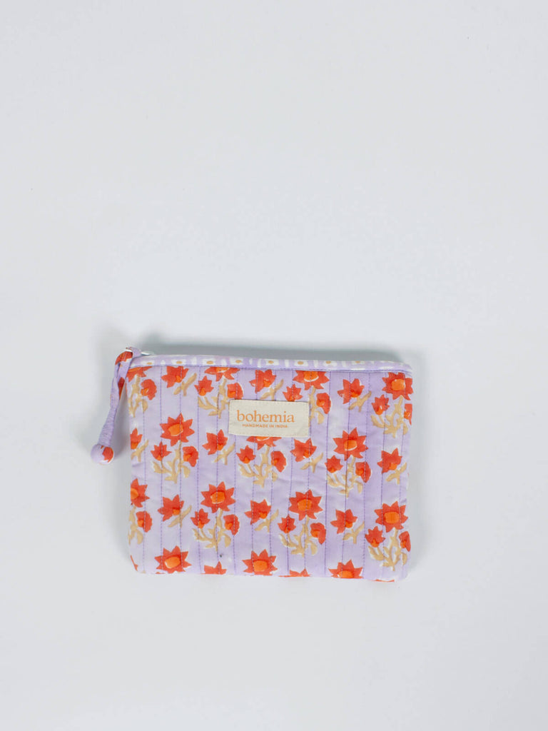 Medium quilted zip pouch with lilac and orange floral block printed pattern