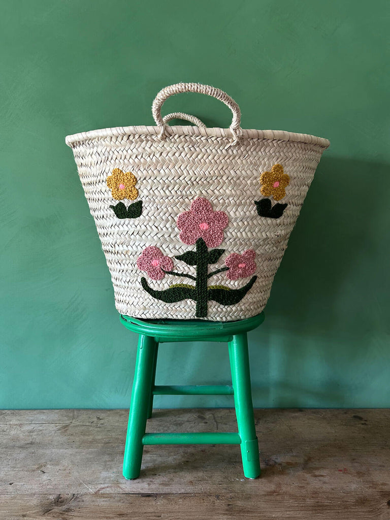 Hand embroidered market basket with two short handles, featuring our posy illustration by Bohemia