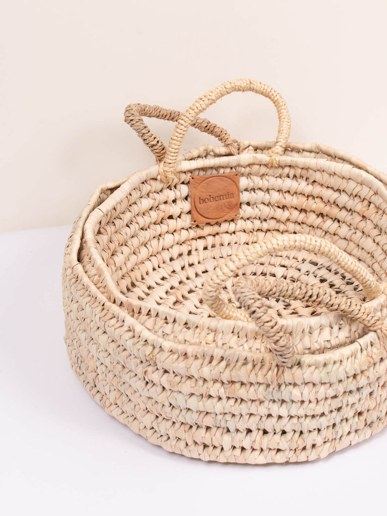 Set of 2 round open weave baskets