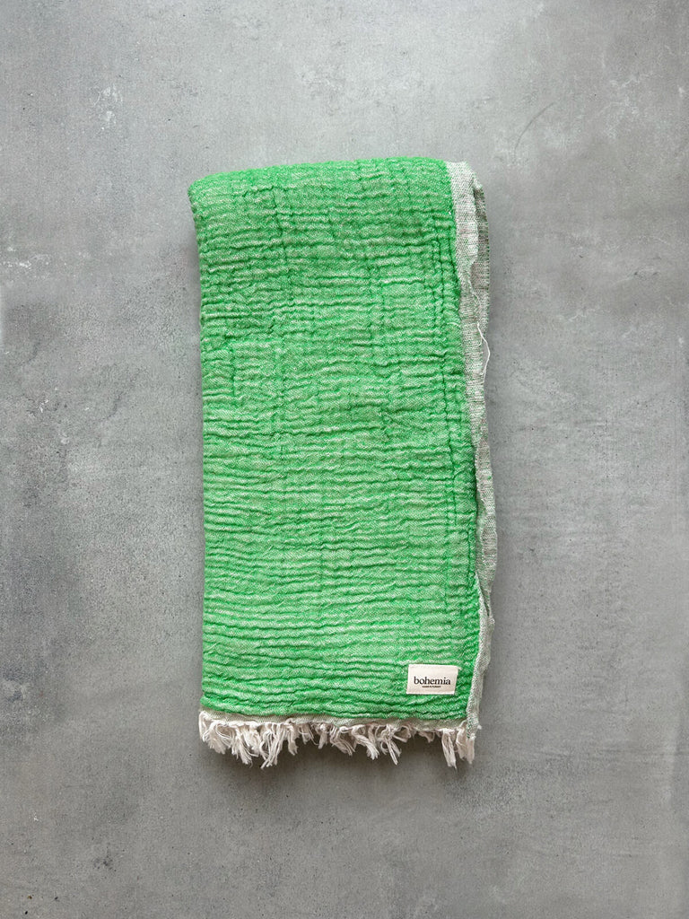Beautifully tactile Samos Hammam Towel in Leaf green and Rose pink by Bohemia Design