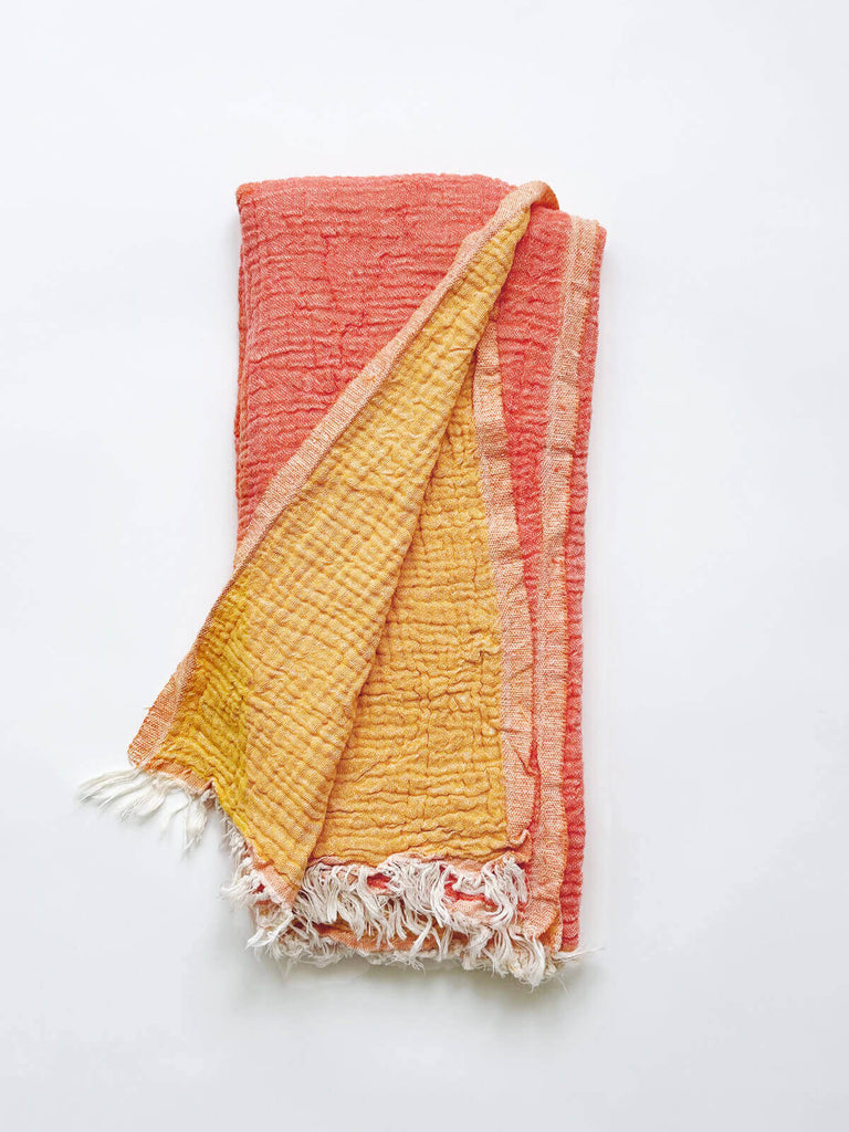 Luxury cotton hammam towel in melon and quince orange tones