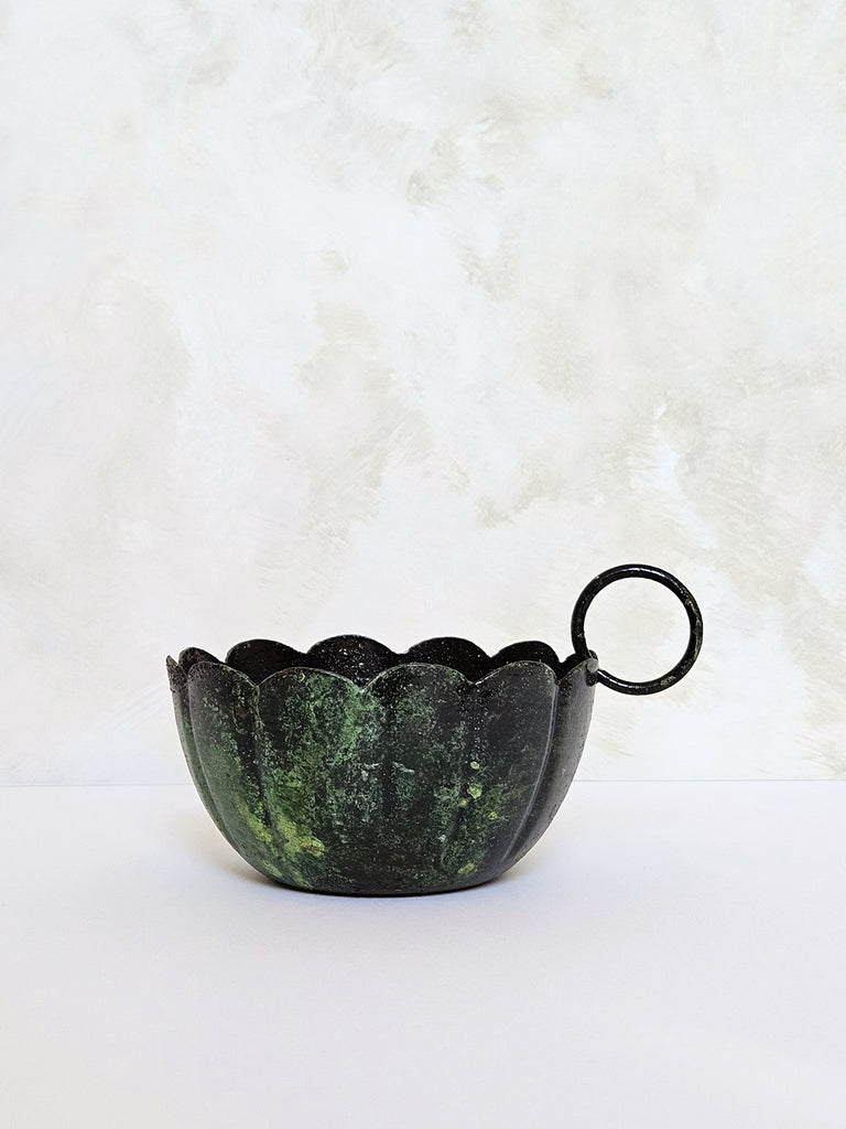  Rustic candle holder with a moss green patina finish by Bohemia