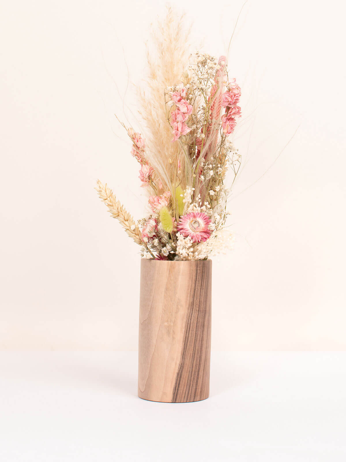 Large wholesale walnut wood vase with pastel coloured dried flowers