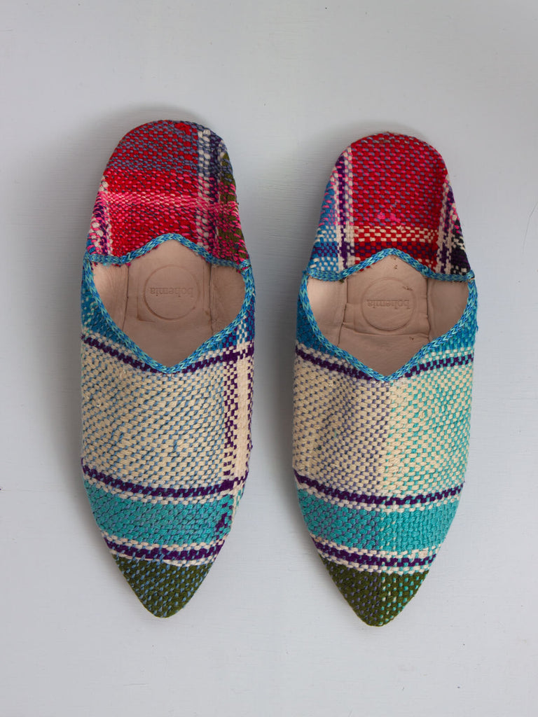 Limited edition Moroccan Boujad Pointed Babouche Slippers with a stripe pattern in blue green and fuchsia pink tones. 