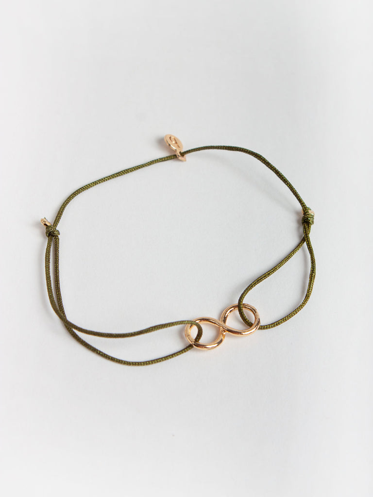 Gold infinity bracelet with olive silk thread by Bohemia Design