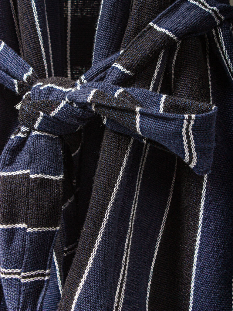Sash tie detail of handwoven cotton jacket in navy stripe by Bohemia Design