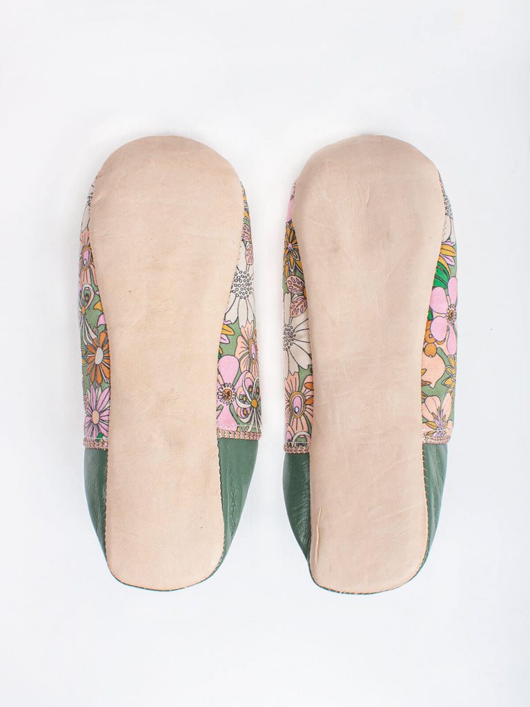 Underside of A pair of Moroccan babouche slippers in an olive and pink floral pattern by Bohemia Design