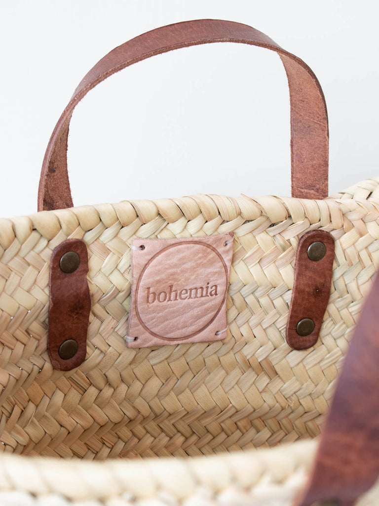 Leather label on Mini valencia basket with tan leather handles by Bohemia Design