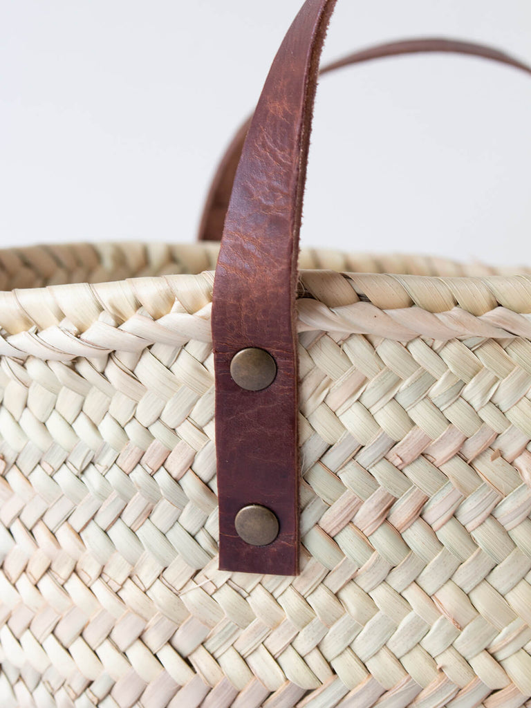 Leather handle detail on mini valencia basket by Bohemia Design