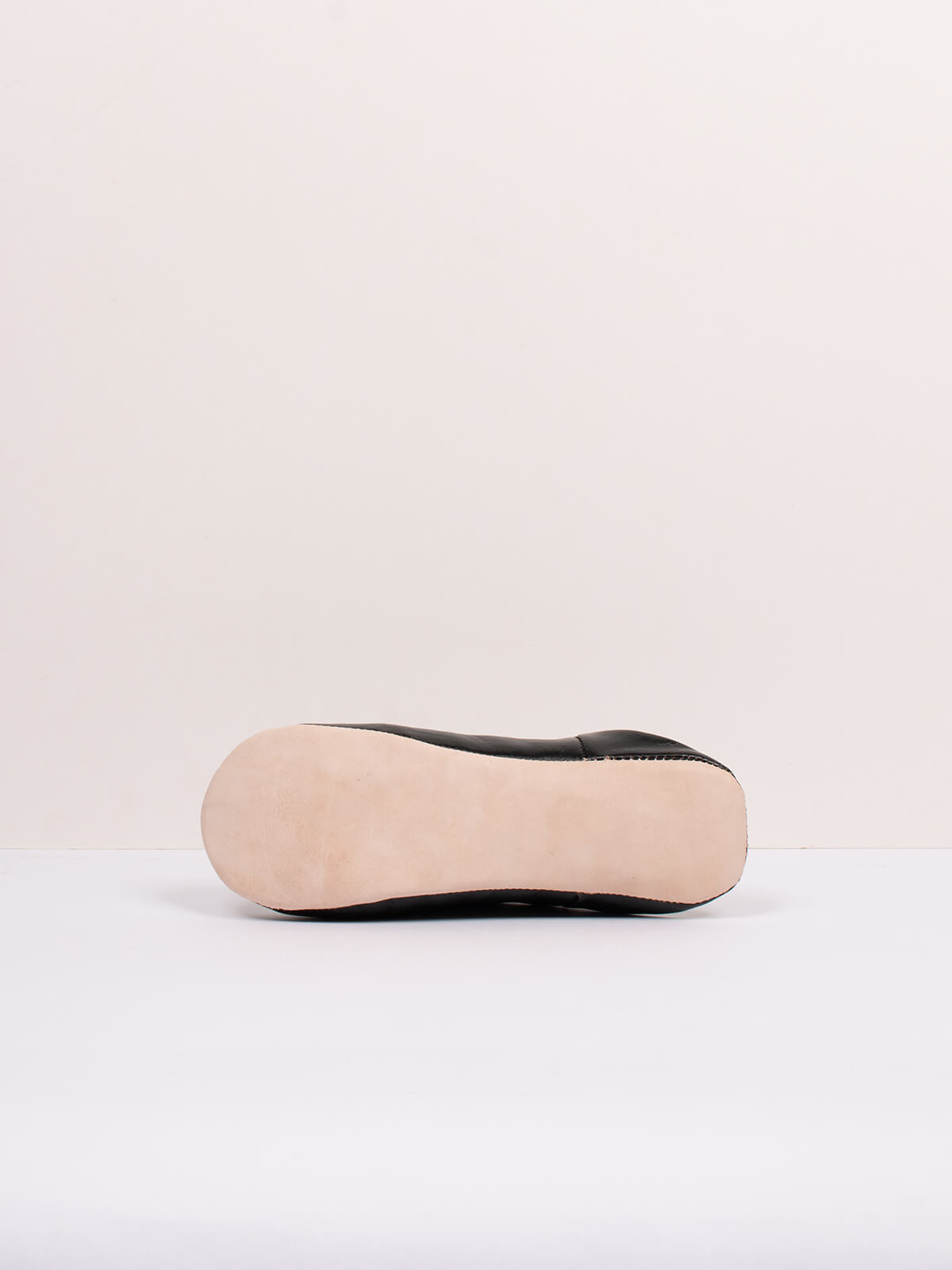 Underside of Moroccan mules babouche basic slippers in black leather by Bohemia Design