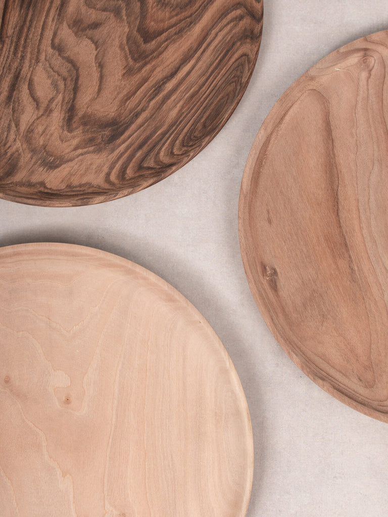 Three Walnut Wood Plates showing variation in the grain