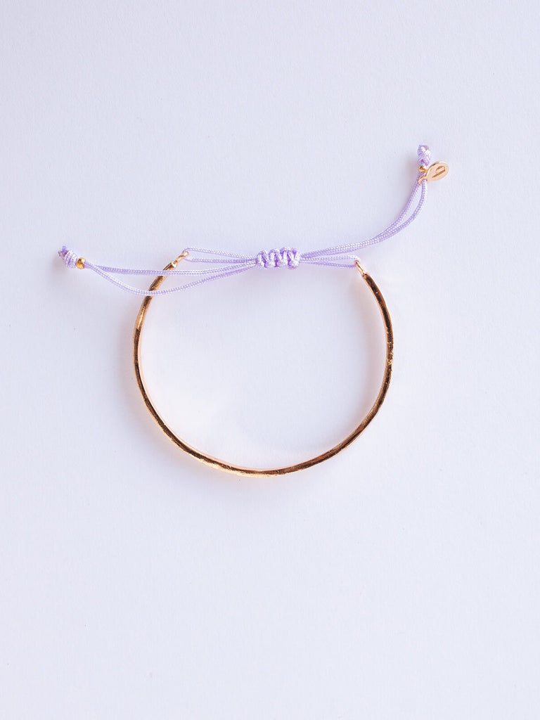Gold celeste bracelet with lilac silk thread by Bohemia Design