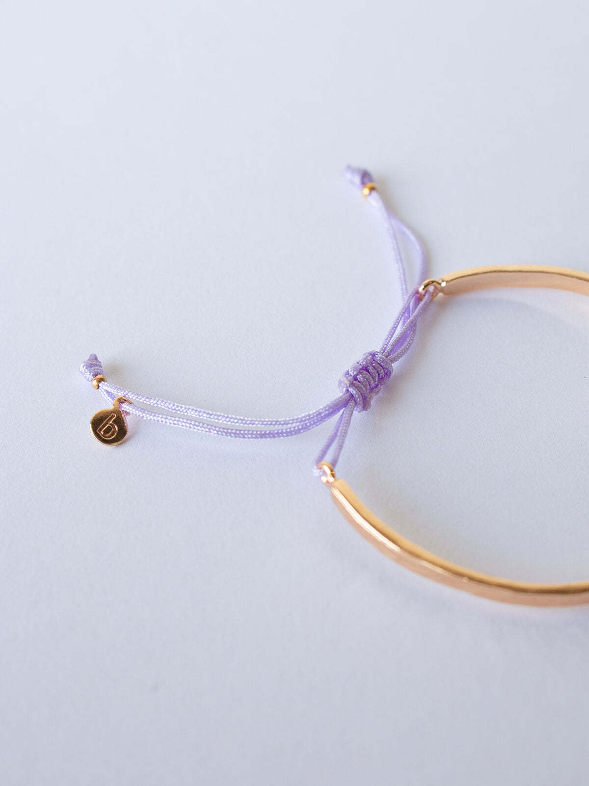 Gold celeste bracelet with lilac silk thread by Bohemia Design