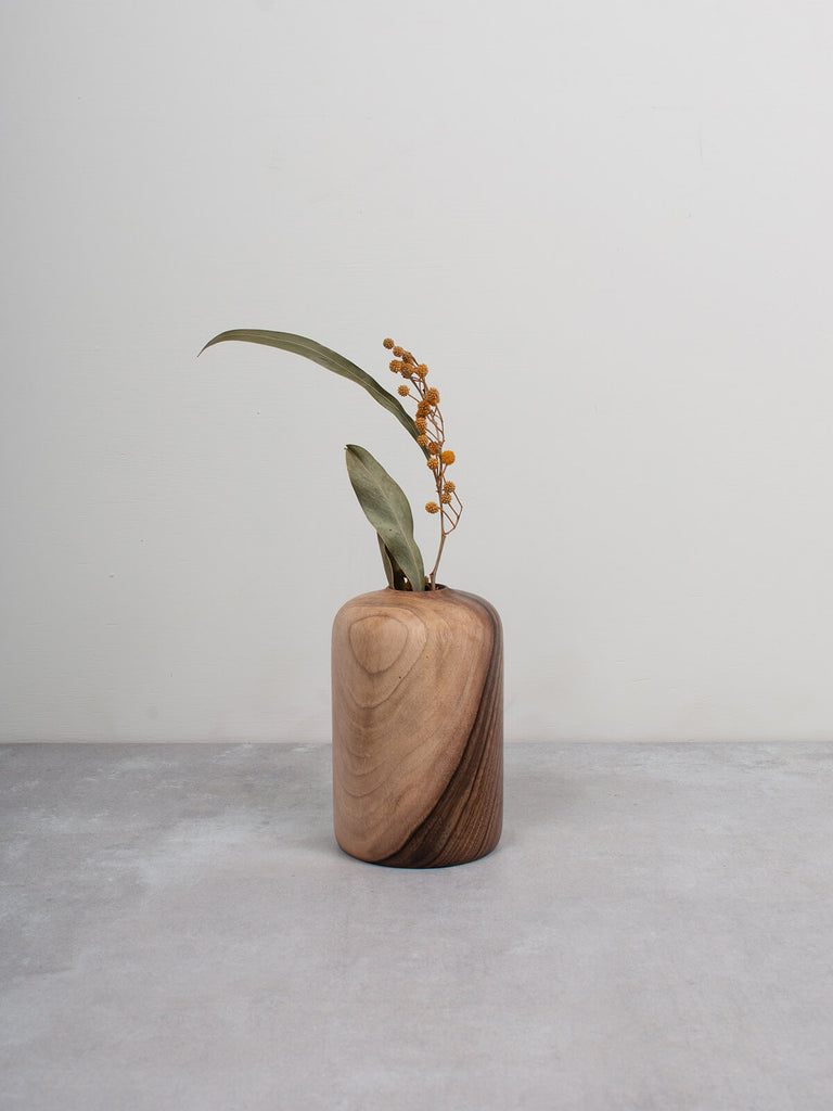 walnut wood mini vase by Bohemia Design with dried flower stems